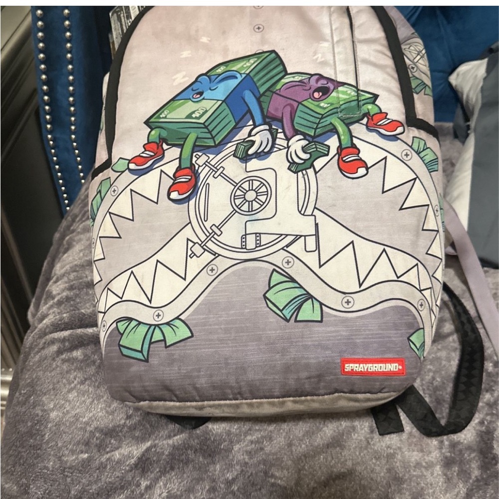 Spray ground backpack